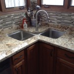 granite countertop with custom tile backsplash